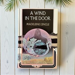 A Wind in the Door by Madeleine L’Engle
Vintage Paperback | Sci-Fi Fantasy